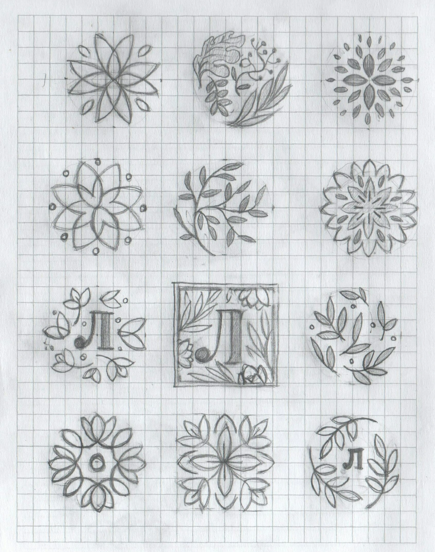 Original Listva pencil sketches exploring floral wreaths and letterforms